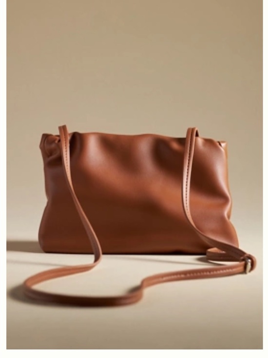 Anthropologie Handbags - BY ANTHROPOLOGIE CINCHED FAUX-LEATHER CLUTCH